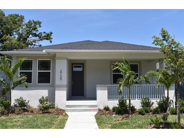 Charming single-story home with well-manicured lawn, fresh landscaping and inviting covered entry at 2735 36Th N Ave, St Petersburg, FL 33713