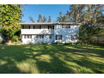 Two-story house with a large yard at 11008 Browning Rd, Lithia, FL 33547