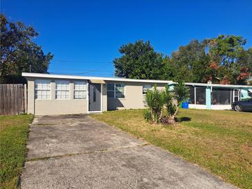 Updated single story home with a large front yard and driveway at 11482 104Th St, Largo, FL 33773