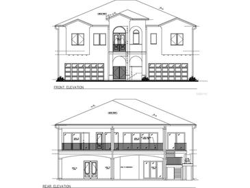 Architectural rendering of a two-story house with a metal roof and attached garage at 6457 1St Palm Pt, St Pete Beach, FL 33706