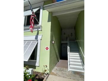 Exterior view of building showing stairs and entrance at 4199 38Th S Ave # I, St Petersburg, FL 33711