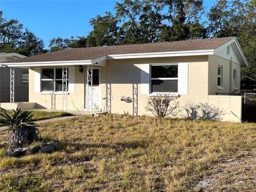 One story home with a well-maintained lawn and updated exterior at 637 64Th S Ave, St Petersburg, FL 33705