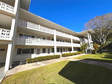 Two-story condo building with landscaped grounds and a spacious layout at 1235 S Highland Ave # 2-308, Clearwater, FL 33756