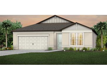 One-story home with a two-car garage and well-manicured lawn at 9817 Crescent Moon Dr, Riverview, FL 33578