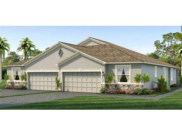 Two-car garage, light grey exterior, and landscaping at 727 157Th E Ct, Bradenton, FL 34212