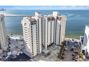 Aerial view of a high-rise building with oceanfront location at 440 S Gulfview Blvd # 905, Clearwater Beach, FL 33767