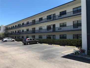 Two-story condo building with ample parking at 5990 Terrace Park N Dr # 201, St Petersburg, FL 33709