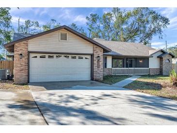 One-story home with attached garage and a spacious yard at 9502 59Th E Ave, Bradenton, FL 34202