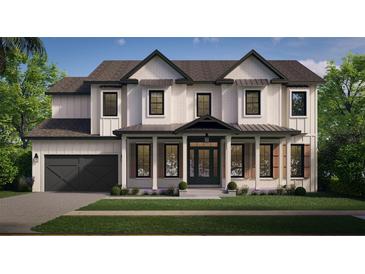Two-story farmhouse with white brick, dark gray accents, and a metal roof at 3818 W Santiago St, Tampa, FL 33629