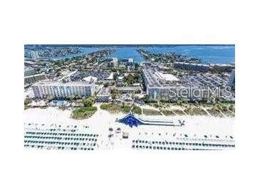 Aerial view of beachfront property showing the surrounding buildings and beach at 5500 Gulf Blvd # 7216, St Pete Beach, FL 33706