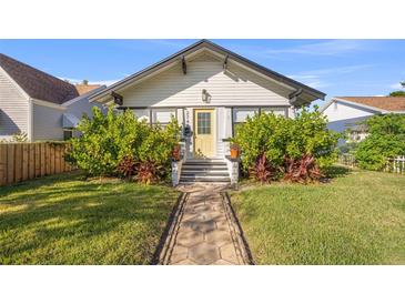 Charming bungalow with landscaped lawn and walkway at 2747 3Rd N Ave, St Petersburg, FL 33713