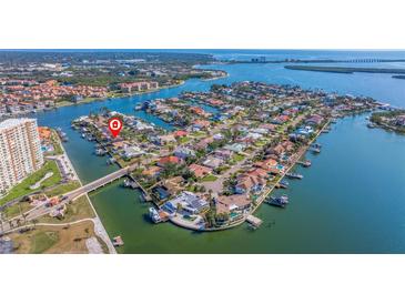 Aerial view of waterfront home and neighborhood at 4973 58Th S Ave, St Petersburg, FL 33715