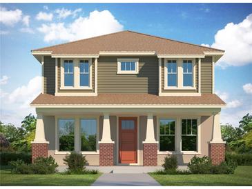 Two-story craftsman style home with a covered porch and brick columns at 320 43Rd Ne Ave, St Petersburg, FL 33703