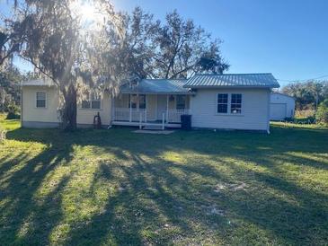 Ranch-style home with a spacious yard at 6658 Williams Rd, Seffner, FL 33584