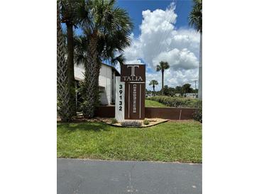 Modern Talia Condominiums sign, welcoming residents and guests to the community at 39132 County Road 54 # 2070, Zephyrhills, FL 33542