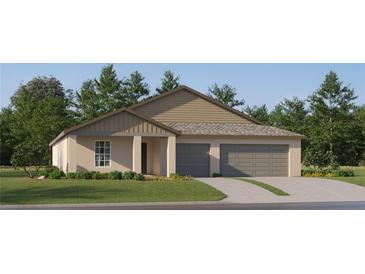 Charming single-story home with a two-car garage and landscaped front yard at 15129 Rainbow Quartz St, Wimauma, FL 33598
