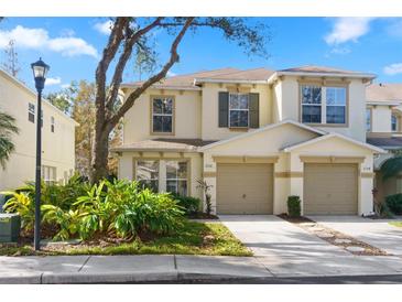 Attractive two-story home with a two-car garage and landscaped front yard at 3152 Royal Tuscan Ln, Valrico, FL 33594