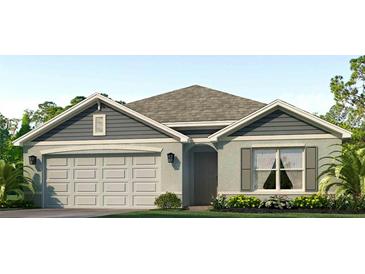 Charming single-story home with a two-car garage and landscaped front yard at 10903 Gentle Current Way, Parrish, FL 34219