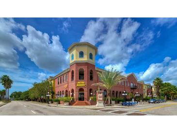 Brick building with Metro Market on the ground floor at 1910 E Palm Ave # 10303, Tampa, FL 33605