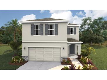 Two-story house with gray siding, gray shutters, and a two-car garage at 3443 Hilltop Cir, Lakewood Ranch, FL 34211