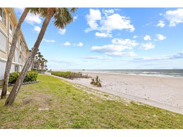 Steps to the beach! Enjoy ocean breezes and white sand at 3400 Gulf Blvd # 105, Belleair Beach, FL 33786