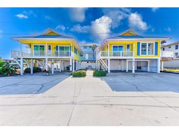 Two charming yellow beach cottages with parking at 1808 Gulf Blvd # 1, Indian Rocks Beach, FL 33785