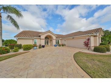 Attractive single-story home with tile roof and landscaped yard at 2337 Platinum Dr, Sun City Center, FL 33573