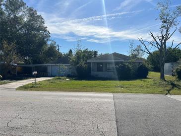 Ranch style home with carport and mature trees at 2508 50Th N Ave, St Petersburg, FL 33714