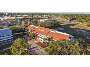 Aerial view showing building location and surrounding area at 2579 Countryside Blvd # 1105, Clearwater, FL 33761