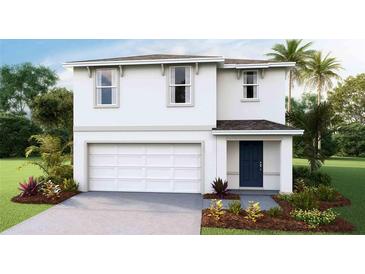 Two-story house with a two-car garage and landscaping at 4477 Sand Dollar Way, Zephyrhills, FL 33541