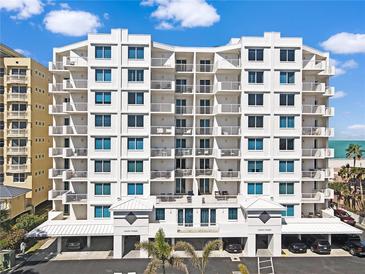 Stylish condo building showcasing contemporary architecture with lots of balconies at 1350 Gulf Blvd, Clearwater, FL 33767