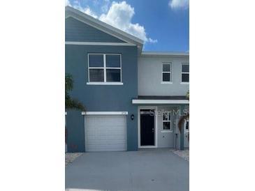 Charming two-story home featuring a one car garage and craftsman style details at 2754 Pearly Banks Dr, Bradenton, FL 34208
