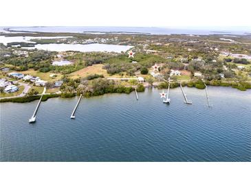 Gorgeous waterfront home site with private dock access and stunning water views at 724 Bayshore Dr, Terra Ceia, FL 34250