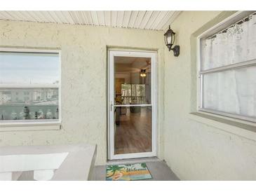 Inviting front entrance with a storm door and a 