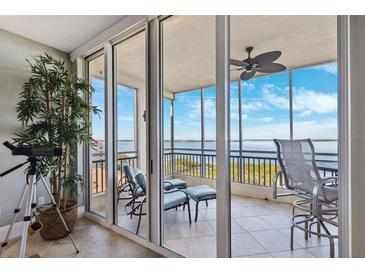 Enjoy serene water views from this delightful balcony with comfortable seating and tile floors at 2825 Terra Ceia Bay Blvd # 1902, Palmetto, FL 34221