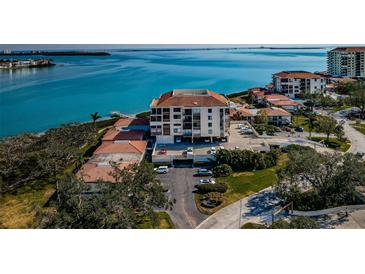 A condo complex nestled along the water, with private boat dock and waterfront views at 6218 Palma Del Mar S Blvd # 208, St Petersburg, FL 33715