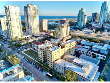 A captivating aerial view of the city skyline, showcasing the stunning waterfront and surrounding buildings at 130 4Th N Ave # 414, St Petersburg, FL 33701