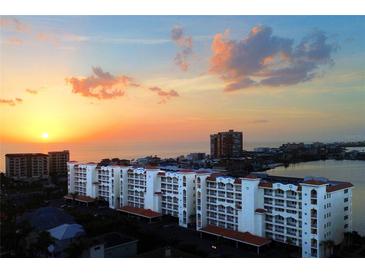 Beautiful condo complex with waterfront view and sunset over the ocean at 17717 Gulf Blvd # 601, Redington Shores, FL 33708