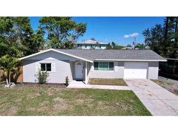 Charming single-story home featuring a well-maintained front yard and attached one car garage at 620 43Rd Street W Blvd, Palmetto, FL 34221