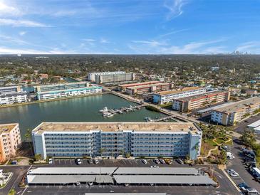 Stunning aerial view of the condo complex, highlighting its waterfront location and proximity to the city at 5925 Shore S Blvd # 406, Gulfport, FL 33707