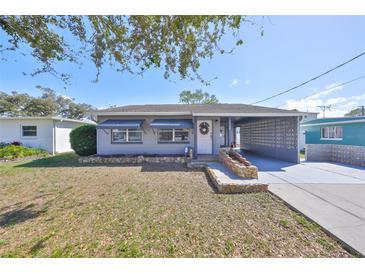 Charming single-story home with a covered carport and welcoming front entrance at 1520 S Richard Ave, Tampa, FL 33629