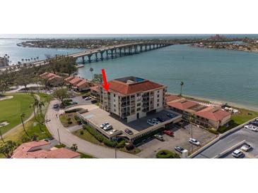 Stunning building offers waterfront living, convenient parking, and beautiful golf course views from many units at 6279 Sun Blvd # 605, St Petersburg, FL 33715