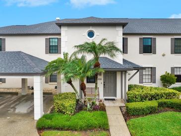 Charming two-story townhouse with a landscaped yard and covered entry at 4524 Southampton Ct # 4524, Tampa, FL 33618