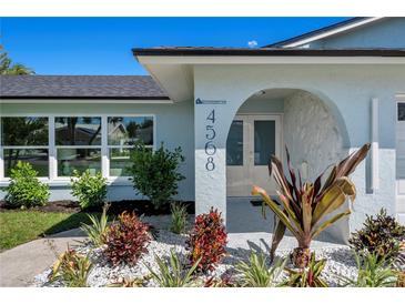 A well maintained house with a well maintained lawn and garden at 4568 40Th S St, St Petersburg, FL 33711