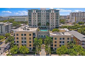 Stunning high-rise condo building with a rooftop pool, offering luxurious urban living and picturesque city views at 400 4Th S Ave # 704, St Petersburg, FL 33701