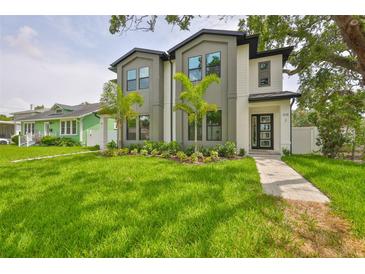 Beautiful modern two-story home with well-manicured lawn and neatly landscaped garden at 418 W Frances Ave # 1, Tampa, FL 33602