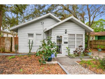 Charming single-story home with a well-maintained yard and neutral color palette at 8306 N 10Th St, Tampa, FL 33604