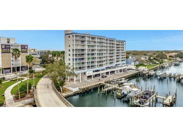 Waterfront condo complex featuring multiple balconies and boat docks on the water at 2 Adalia Ave # 803, Tampa, FL 33606