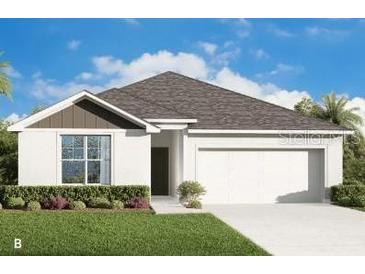 Charming one-story home showcasing a well-manicured lawn and a two-car garage, blending comfort and curb appeal at 4754 Easter Ter, North Port, FL 34286