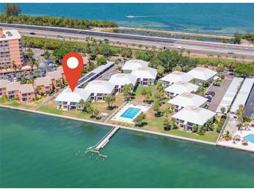 Stunning waterfront condos with a pool, private dock, and beautiful views of the bay and direct access to the ocean at 7310 Sunshine Skyway S Ln # 219, St Petersburg, FL 33711
